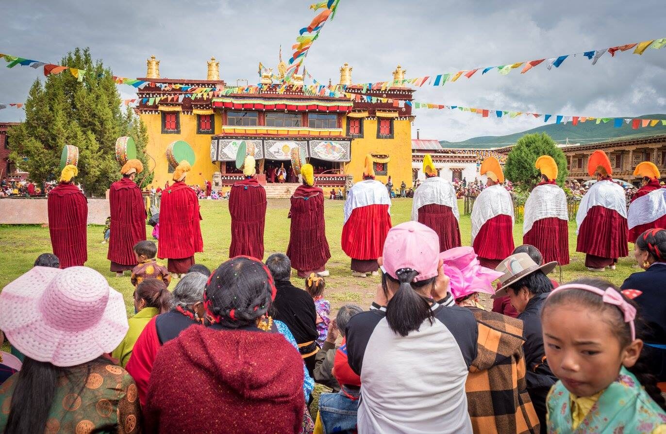 Witnesses gathered at a Cham festival in Tashi Dekyid Monet's home village on the eastern Tibetan plateau.